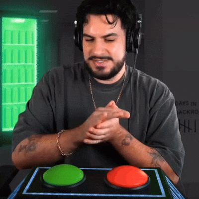 a man wearing headphones is clapping in front of a sign that says ' days in jackro '