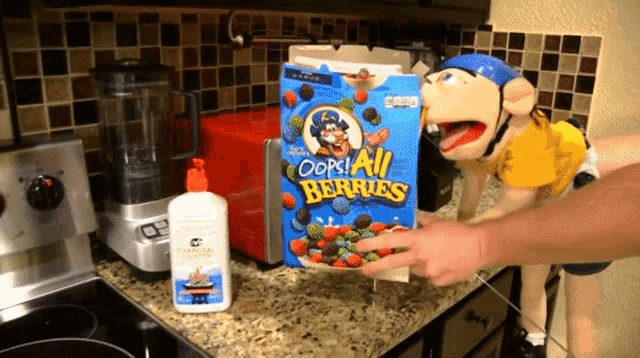a box of oops all berries cereal is on a counter