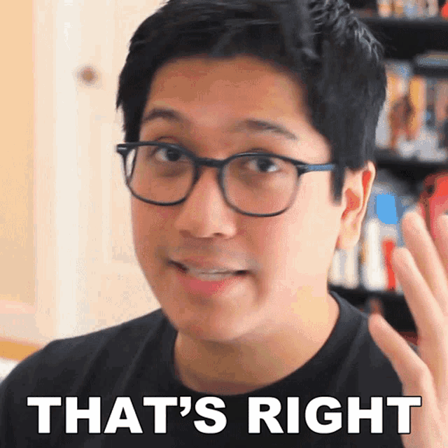 a man wearing glasses says " that 's right "