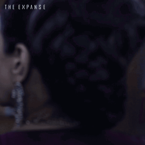 an ad for the expanse shows a woman in a sari