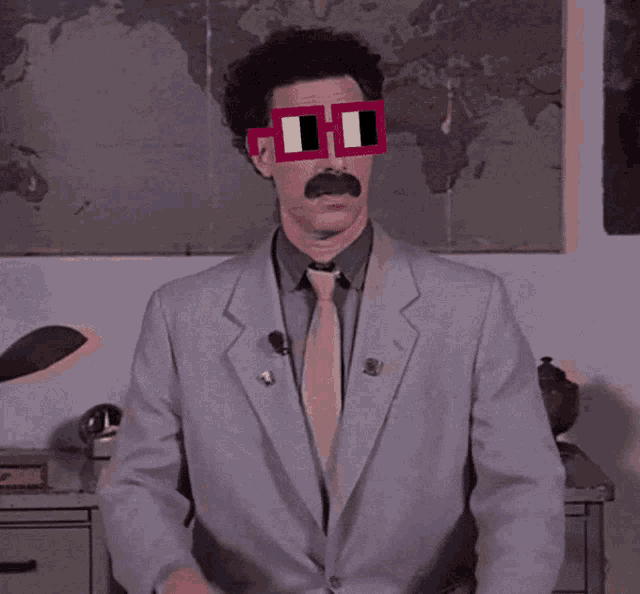 a man in a suit and tie is wearing a pair of sunglasses that say 00 on them