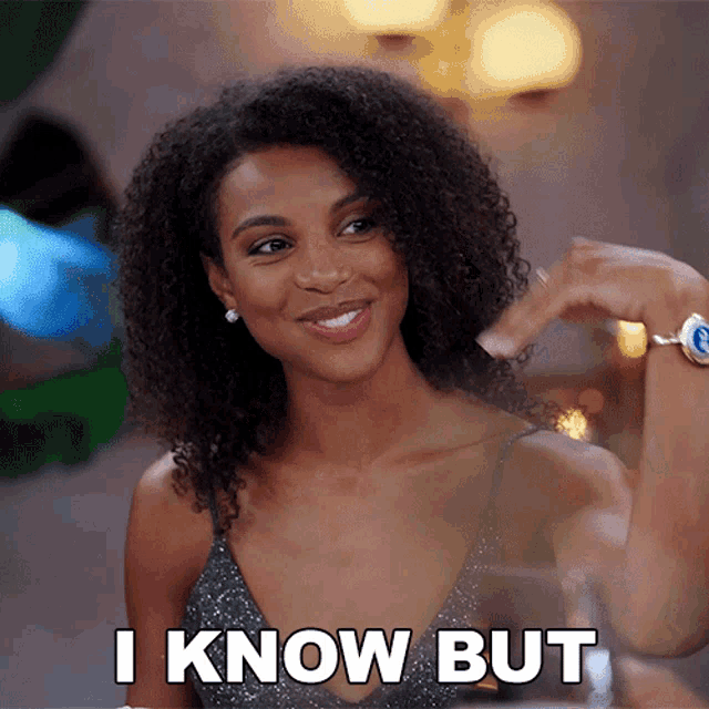a woman says i know but while holding a glass