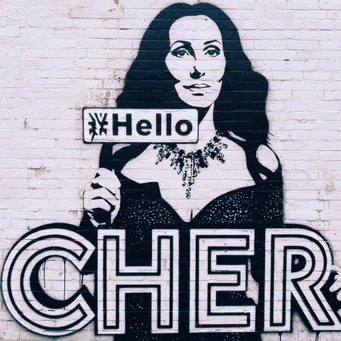 a mural of cher holding a sign that says hello cher