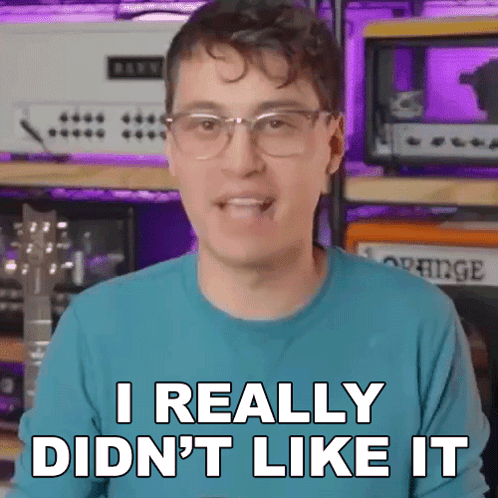 a man with glasses and a blue shirt says i really didn 't like it