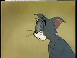 Tom from Tom and Jerry gives a weary, sleepy look.