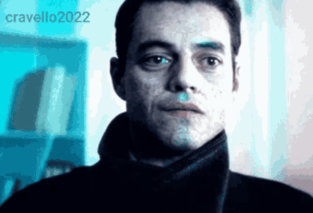 a close up of a man 's face with the year 2022 on the bottom right