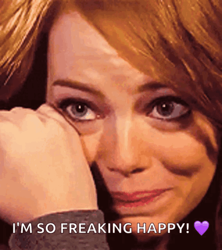A teary-eyed woman covers her mouth, captioned “I’M SO FREAKING HAPPY!”