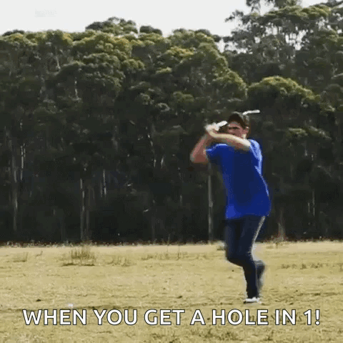 a man is swinging a golf club in a field with the words `` when you get a hole in 1 ! ''