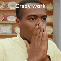 a man covering his mouth with his hands and the words crazy work written above him