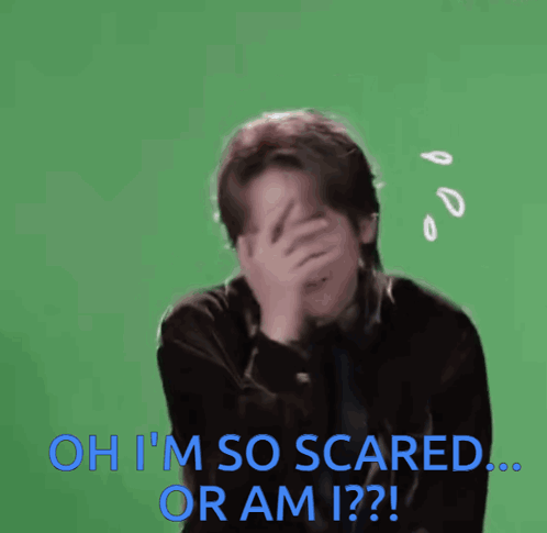 A person covers their face while text asks, “Oh I’m so scared... or am I??!”