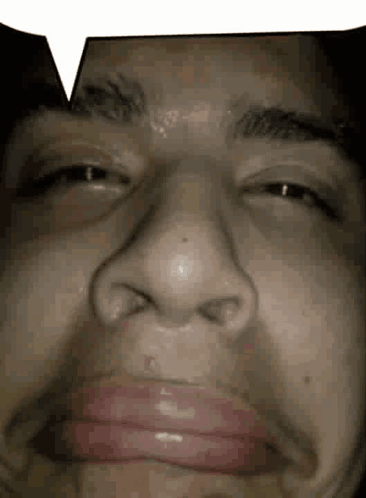 A grayscale close-up of a face appears beneath a blank comic speech bubble.