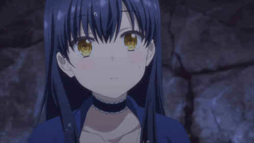 a girl with blue hair and yellow eyes covering her mouth with her hands