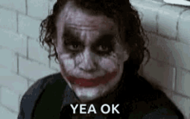 The Joker looks down with “YEA OK” text.