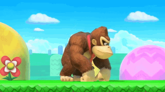 Donkey Kong pauses in a colorful side-scrolling game scene.