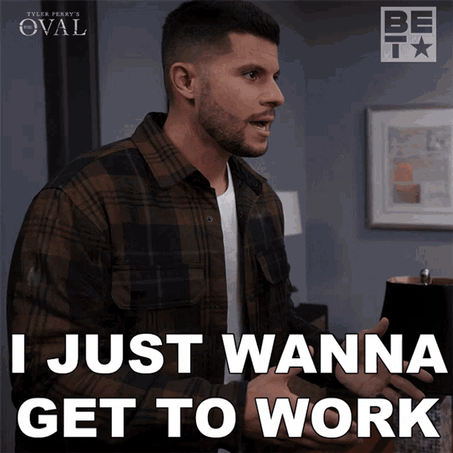 a man says " i just wanna get to work " while wearing a plaid shirt