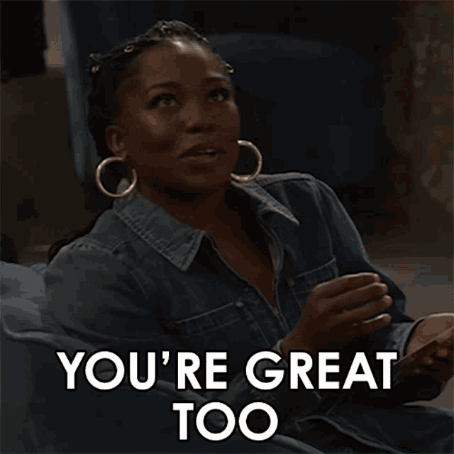 a woman sitting in a chair with the words you 're great too