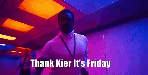 a man is dancing in a room with the words thank kier it 's friday written on the bottom .