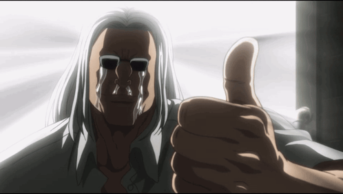 a man with tears running down his face gives a thumbs up