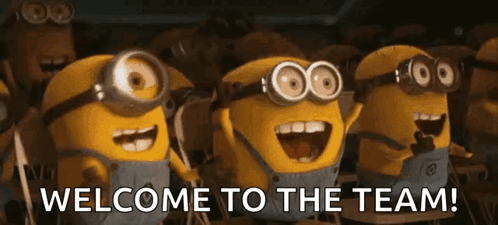 a group of minions are standing in a line with the words welcome to the team
