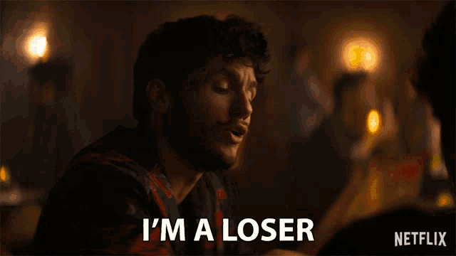 a man says i 'm a loser in front of a netflix logo