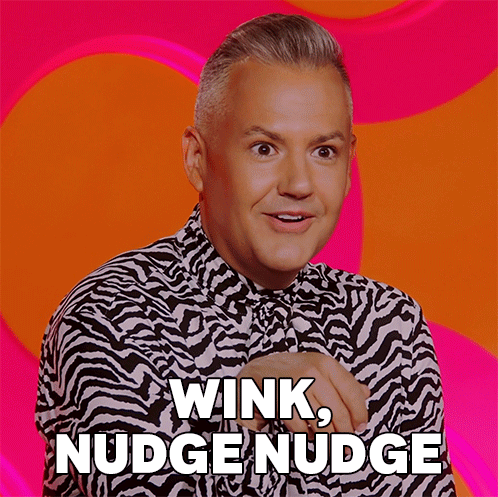 a man in a zebra print shirt with the words wink nudge nudge behind him