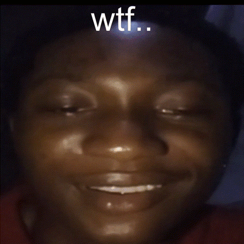 a close up of a person 's face with the words wtf on the top