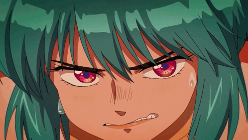 a girl with green hair and red eyes looks angry