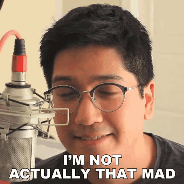a man wearing glasses says " i 'm not actually that mad "