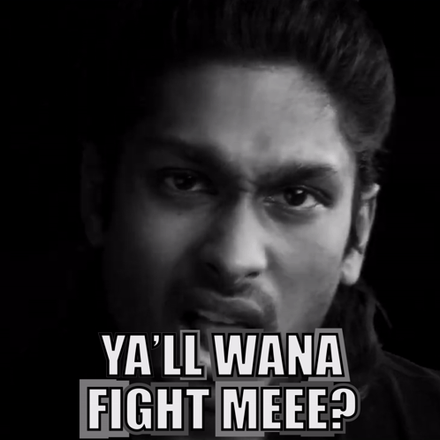 a black and white photo of a man with the words ya ll wana fight meee
