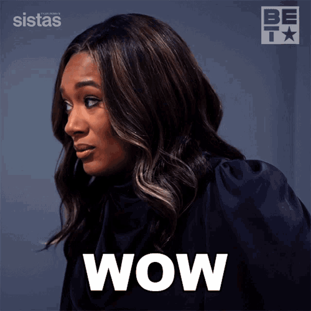 A woman gives a strong side-eye beneath a bold “WOW” caption.