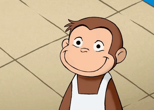 a cartoon monkey wearing an apron and smiling