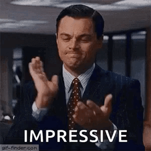 Leonardo DiCaprio claps with the caption “IMPRESSIVE.”