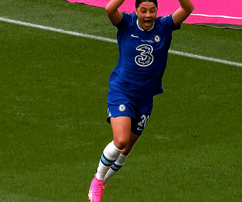 a soccer player in a blue jersey with the number 3 on it