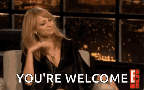 A woman flips her hair with “YOU’RE WELCOME” written across the bottom.