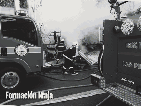 a black and white photo of firefighters with the words formacion ninja