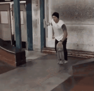 a man is riding a skateboard on a ramp .