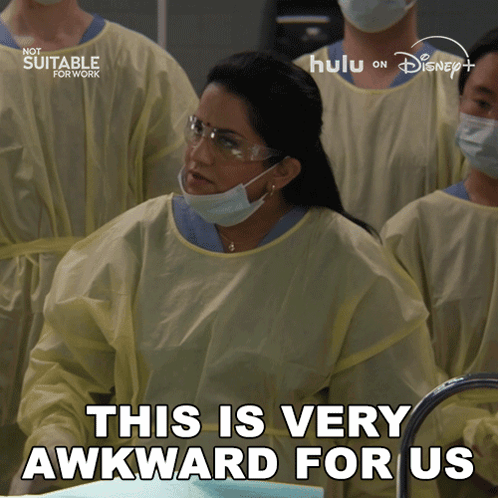 A masked medical team looks tense under the caption “THIS IS VERY AWKWARD FOR US.”