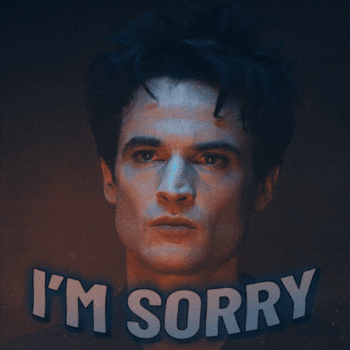 a close up of a man 's face with the words i 'm sorry above it