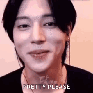 a close up of a person 's face with the words `` pretty please '' written on his face .
