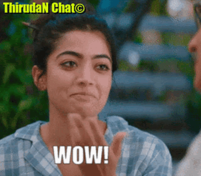 A woman gives a restrained impressed expression with “WOW!” text.