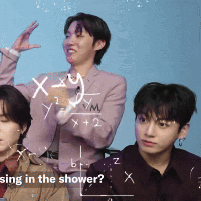 Jungkook appears beside a playful math-equation overlay with other people partially visible.
