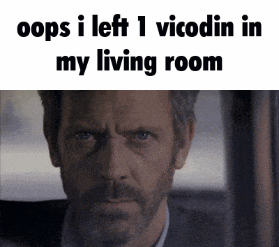 a man with a beard is looking out a window with the caption oops i left 1 vicodin in my living room above him