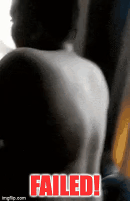 a black and white photo of a person 's back with the words failed in red letters