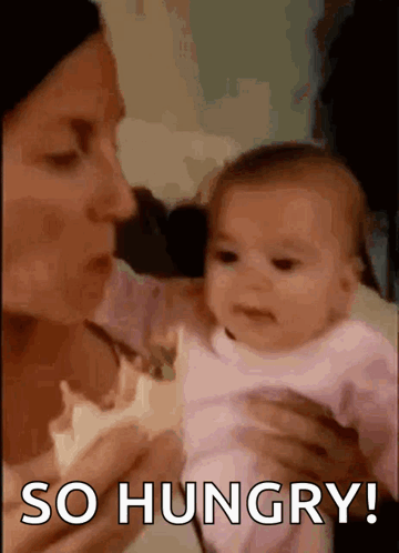 A baby is held close while the caption says “SO HUNGRY!”