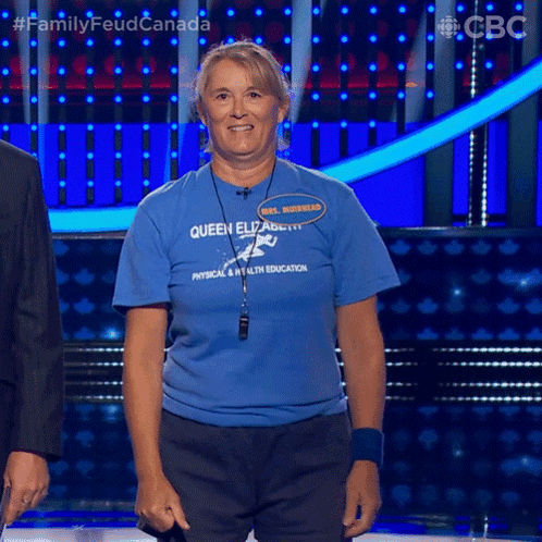 a woman wearing a blue queen elizabeth shirt