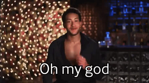 a man in a black shirt says " oh my god "