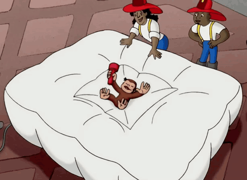 a cartoon of a monkey laying on a blanket