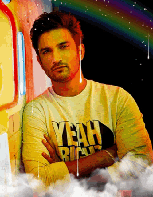 a man leaning against a wall wearing a yeah right shirt
