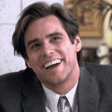 Jim Carrey smiles warmly in a scene from Yes Man.