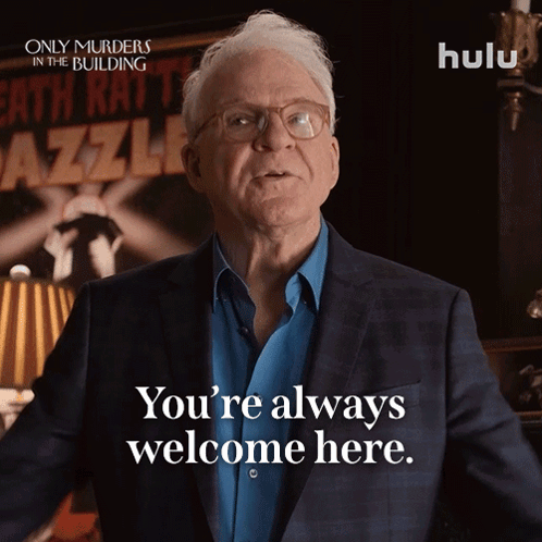 an advertisement for only murders in the building shows a man in a suit